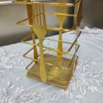 Golden Metal Stand: Unique Design Combining Functionality and Aesthetics